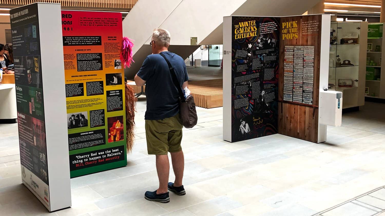 Visitor looking at Malvern Winter Gardens Timeline from RATH