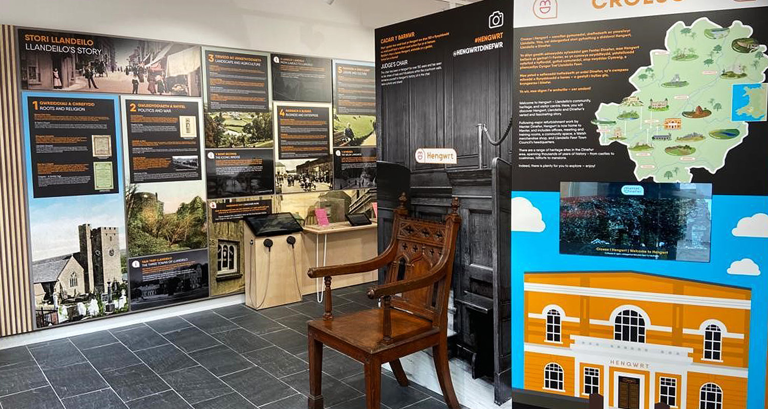 Chair in front of signage at Llandeilo Heritage Centre landscape