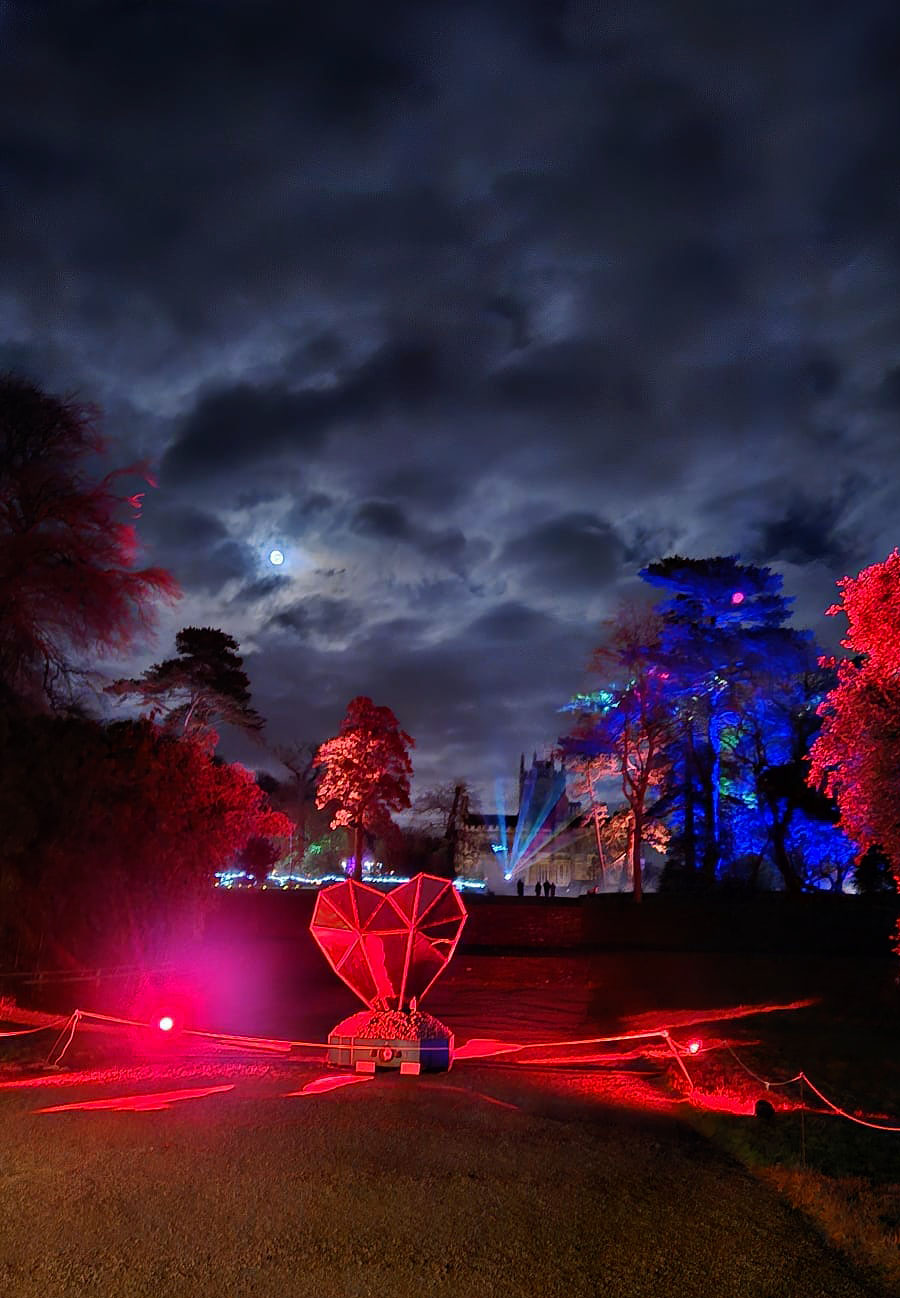 Heart with Bespoke Subwoofer base at night in Margam Park from a distance