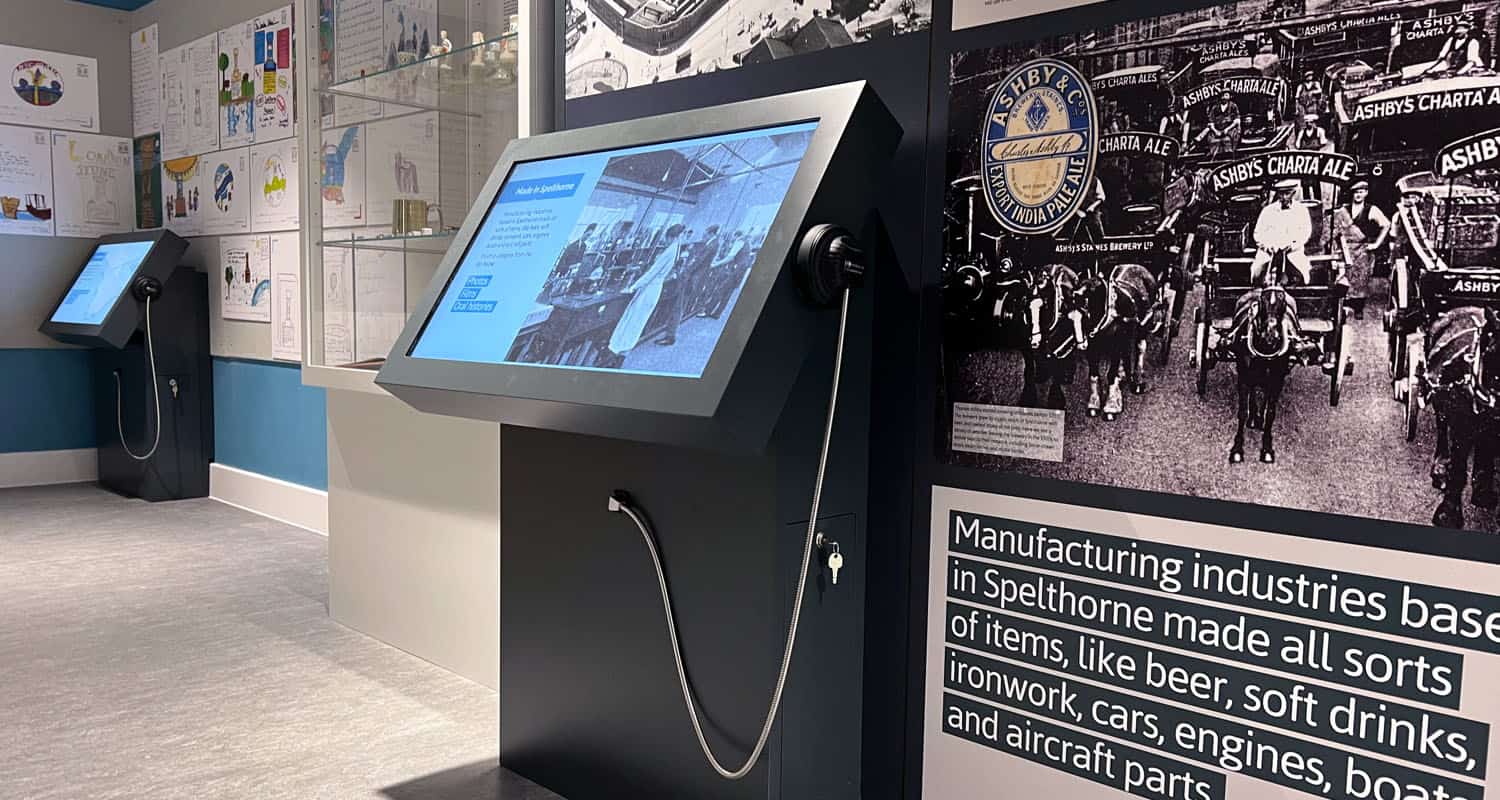 32 Inch Touchscreens with Single Cup Headphones and Lightbox 3 at Spelthorne Museum
