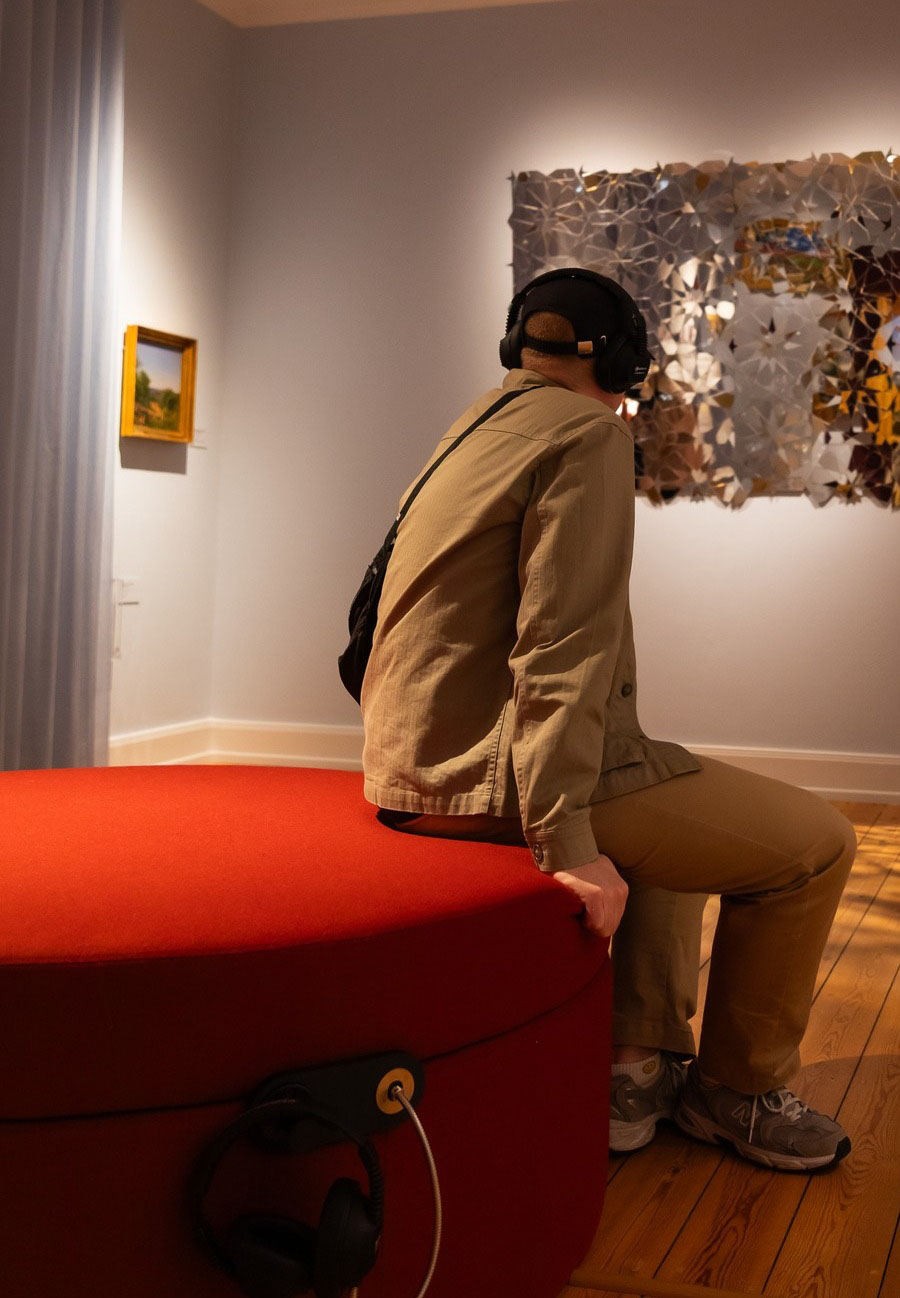 MKII Headphones with Horizontal Recoiler in use at Vejle Art Museum (portrait)