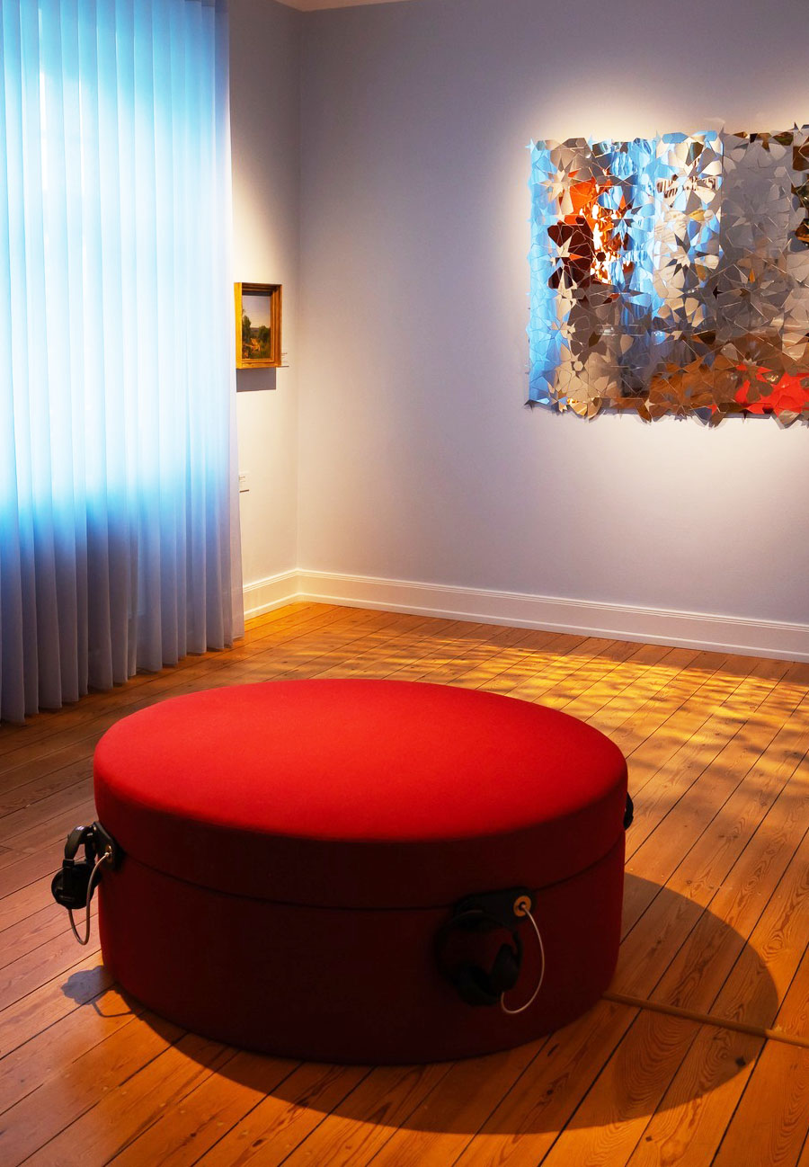 MKII Headphones with Horizontal Recoilers built into furniture at Vejle Art Museum (portrait)