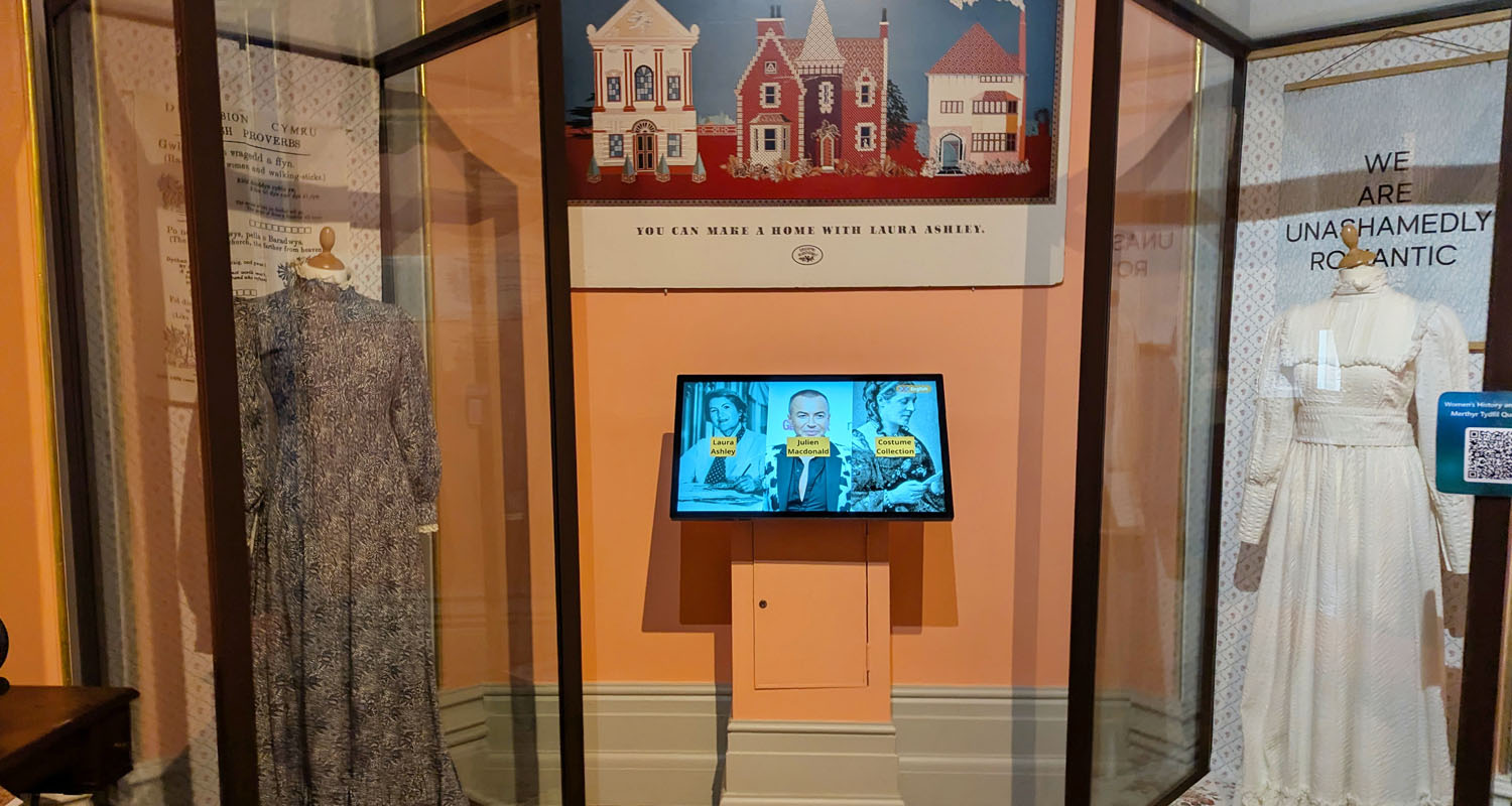 Touchscreen running Lightbox 3 near dresses at Cyfarthfa Castle