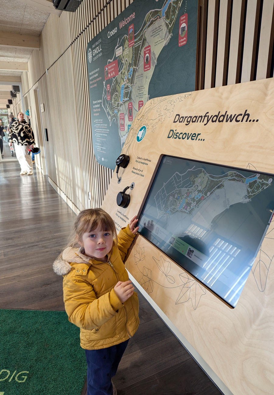32 Inch Touchscreen with Handset Recoilers and Lightbox 3 in bespoke kiosk at Gnoll (portrait)